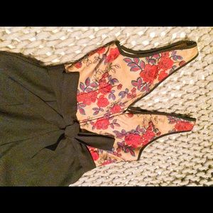 Black and floral romper- size small